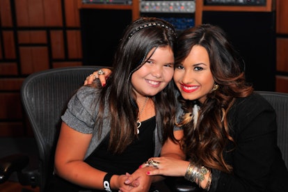 HOLLYWOOD, CA - JULY 21:  Actress/singer Demi Lovato (R) and sister actress Madison De La Garza atte...