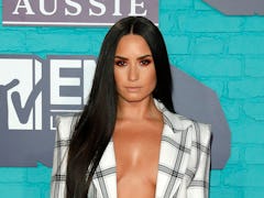 LONDON, ENGLAND - NOVEMBER 12:  Demi Lovato attends the MTV EMAs 2017 held at The SSE Arena, Wembley...