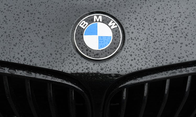 BMW logo on the hood of a black car.