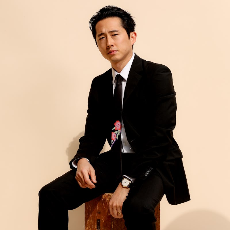 PASADENA, CALIFORNIA - MARCH 07: Steven Yeun, wearing PRADA, gets ready for the 26th annual Critics ...