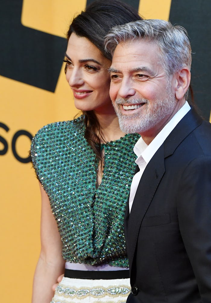 George Clooney et sa femme Amal Alamuddin assistent à la première de la série TV 'Catch-22' le 13 ma...