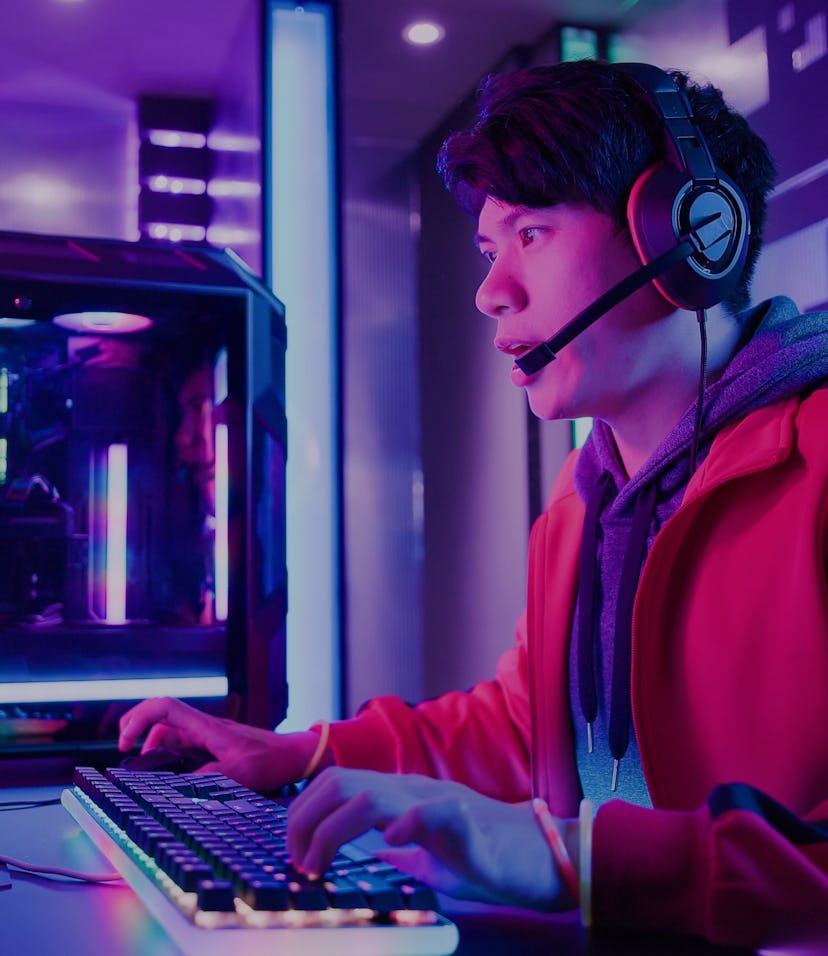 Young Asian Handsome Pro Gamer win in Online Video Game