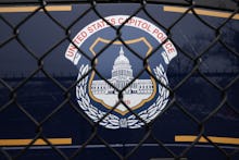 WASHINGTON, DC - FEBRUARY 19: The United States Capitol Police seal appears on the side of a bus par...