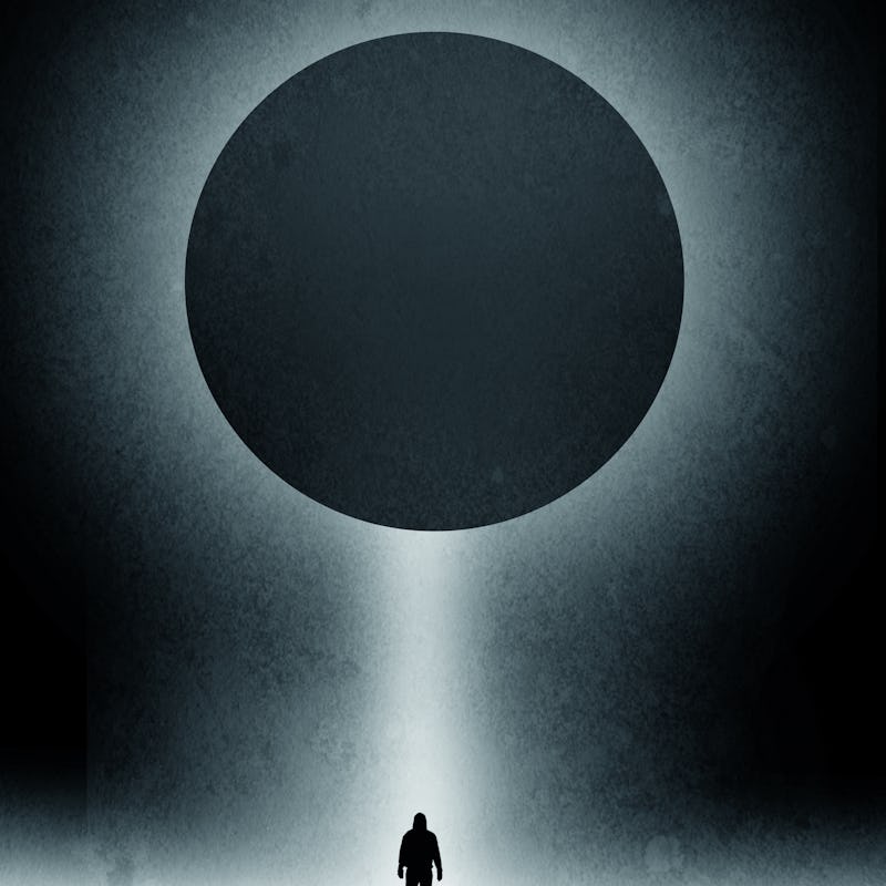 A minimal science fiction edit of a hooded silhouette of a figure of a man standing below a light be...