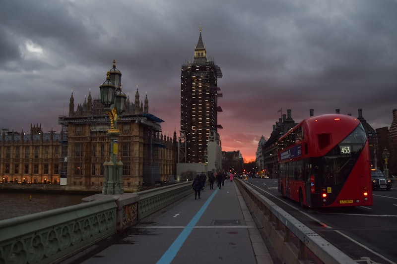 LONDON, UNITED KINGDOM - 2021/03/17: A dramatic sunset over the Houses of Parliament in London. (Pho...