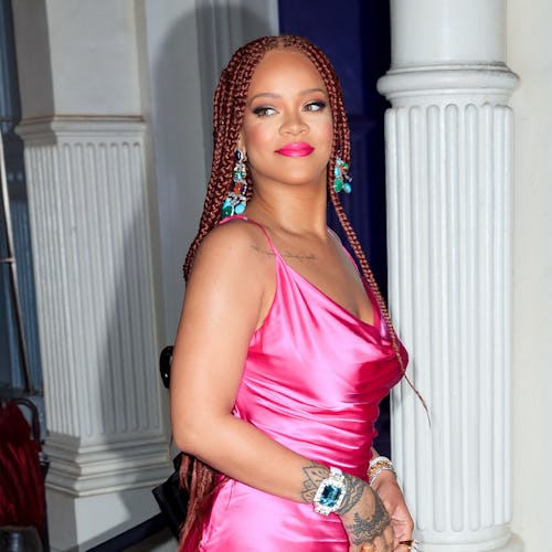 NEW YORK, NY - JUNE 18:  Rihanna wears a hot pink dress when arriving at a Fenty event on June 18, 2...