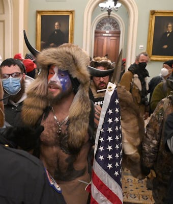 TOPSHOT - Supporters of US President Donald Trump, including member of the QAnon conspiracy group Ja...