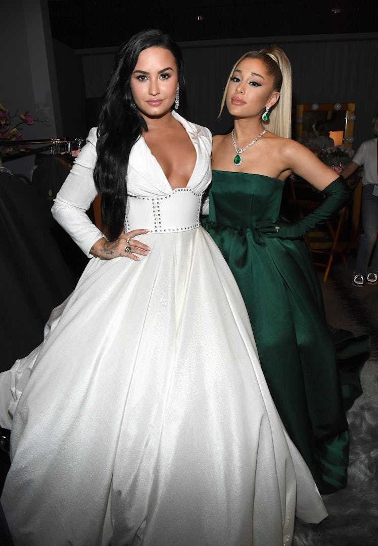 LOS ANGELES, CALIFORNIA - JANUARY 26: Demi Lovato and Ariana Grande during the 62nd Annual GRAMMY A...