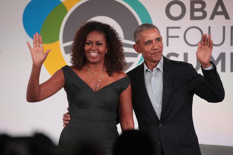 CHICAGO, ILLINOIS - OCTOBER 29: Former U.S. President Barack Obama and his wife Michelle close the O...