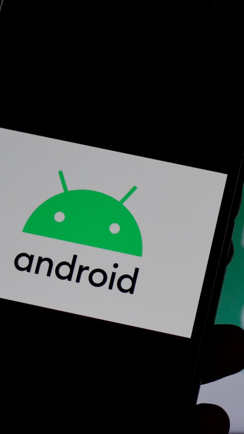 In this photo illustration Android 10 logo can be seen on a mobile screen as well as on a laptop scr...