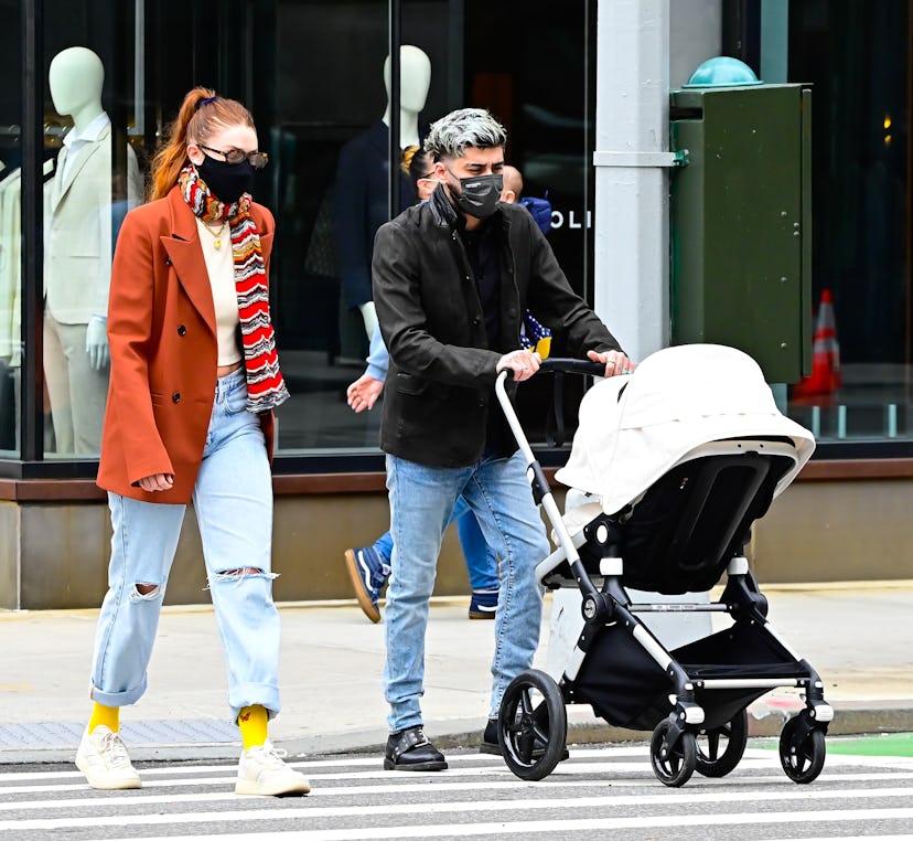 Gigi Hadid and Zayn Malik are seen walking in SoHo on March 25, 2021 in New York City. 