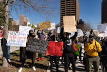 ATLANTA, GA - MARCH 03: Demonstrators stand outside of the Georgia Capitol building, to oppose the H...