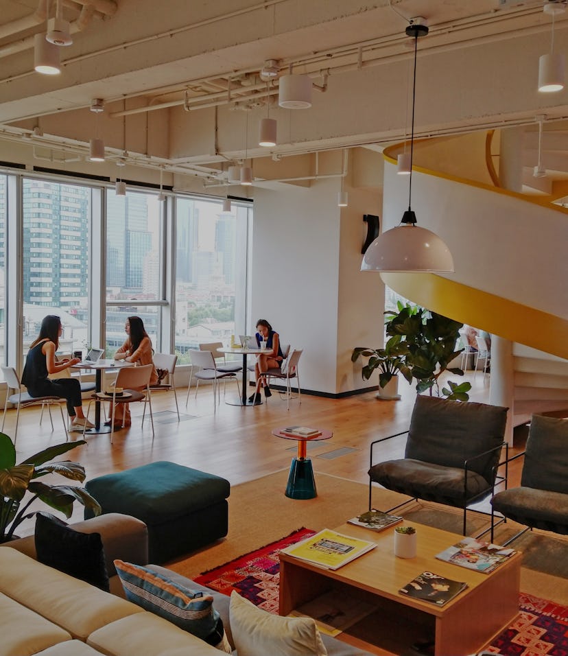 SHANGHAI, CHINA - AUGUST 13, 2019 - Employees work at a WeWork office in Shanghai, China, Aug. 13, 2...
