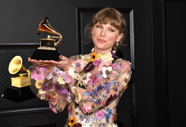 LOS ANGELES, CALIFORNIA - MARCH 14: Taylor Swift, winner of Album of the Year for 'Folklore', poses ...