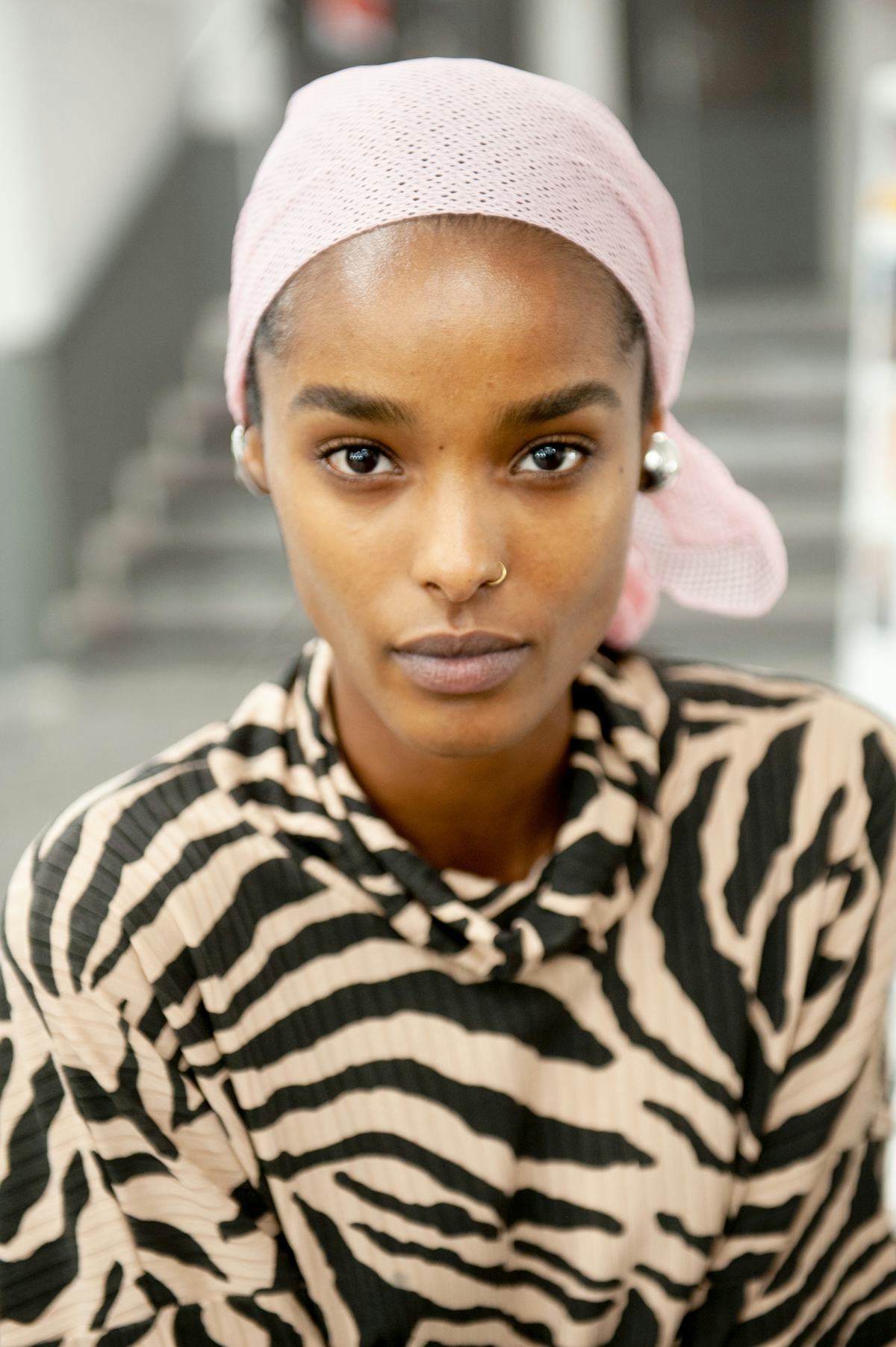 PARIS, FRANCE - MARCH 04: (EDITORIAL USE ONLY) A model prepares backstage prior to the Coperni show ...