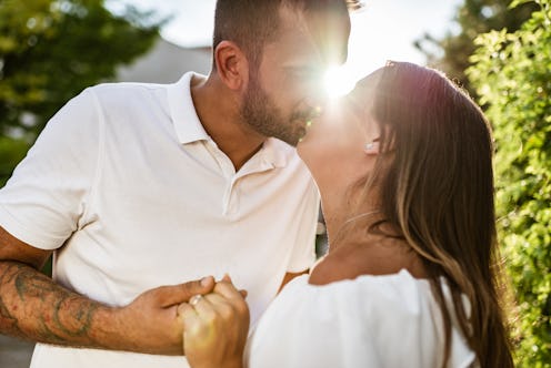 Young couple getting engaged.
