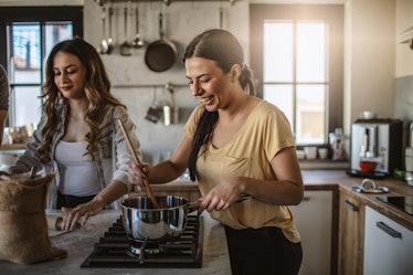 Best friends preparing mac and cheese at home to recreate one of TikTok's viral mac and cheese recip...