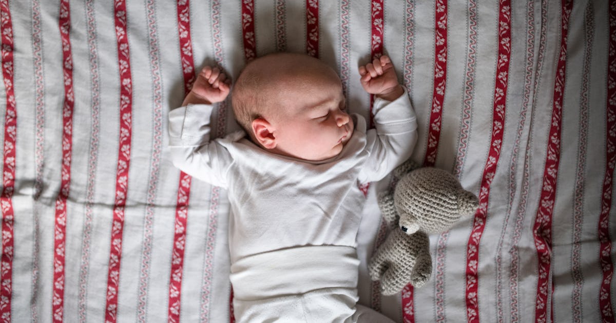 Why Do Babies Sleep With Their Hands Up In The Air This Position Has The Cutest Name Why Do Babies Sleep With Their Hands Up In The Air This Position Has The Cutest Name