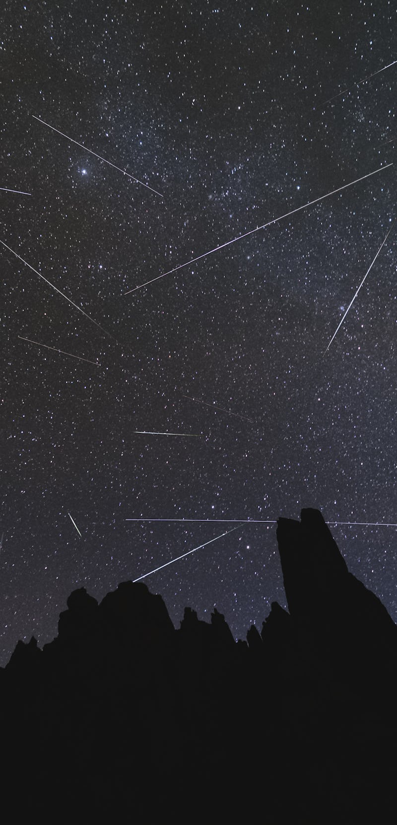 time lapse photo of stars and meteors