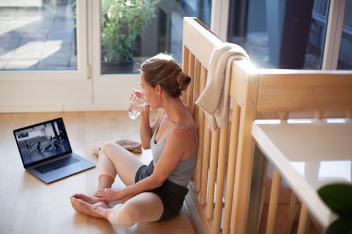 Woman practicing ballet at home due to COVID-19 lockdown