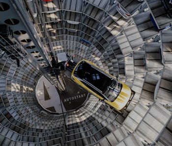 26 March 2021, Lower Saxony, Wolfsburg: A Volkswagen ID.4 stands in a car tower at Autostadt. Volksw...