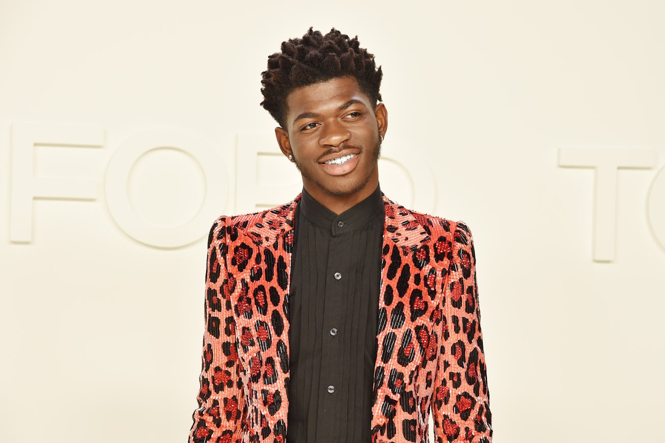 LOS ANGELES, CALIFORNIA - FEBRUARY 07: Lil Nas X attends the Tom Ford AW/20 Fashion Show at Milk Stu...