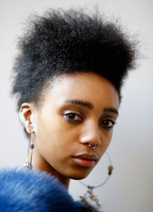 LONDON, ENGLAND - FEBRUARY 23: A model backstage ahead of the Toga show during London Fashion Week ...