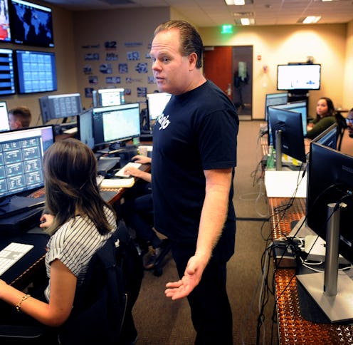 LAS VEGAS, NV - JUNE 19: Banjo founder Damien Patton talks with employees at the Innevation Center ...