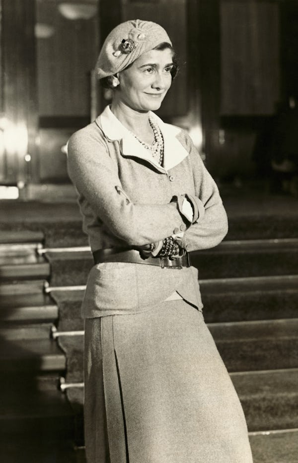 Gabrielle "Coco" Chanel in suit and beret. (Photo by George Rinhart/Corbis via Getty Images)