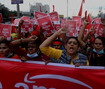 Activists of Sammilito Garments Sramik Federation (Combined Garments Workers Federation) stage a pro...