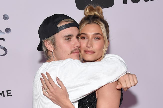 Canadian singer Justin Bieber (L) and wife US model Hailey Bieber arrive for YouTube Originals' "Jus...