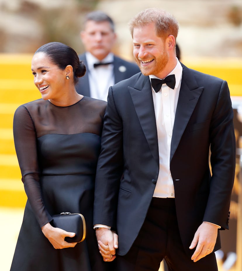 Meghan Markle and Prince Harry attend the 'Lion King' premiere.