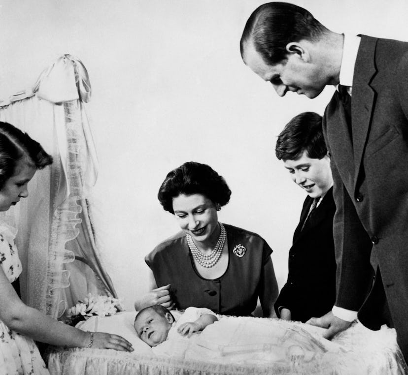Prince Philip admires his new son, 1960.