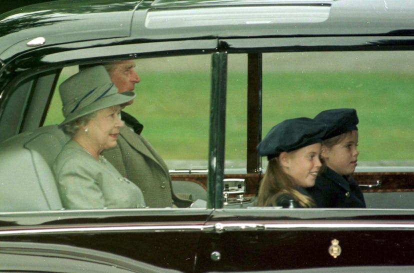 Prince Philip in the car with Princesses Eugenie and Beatrice.