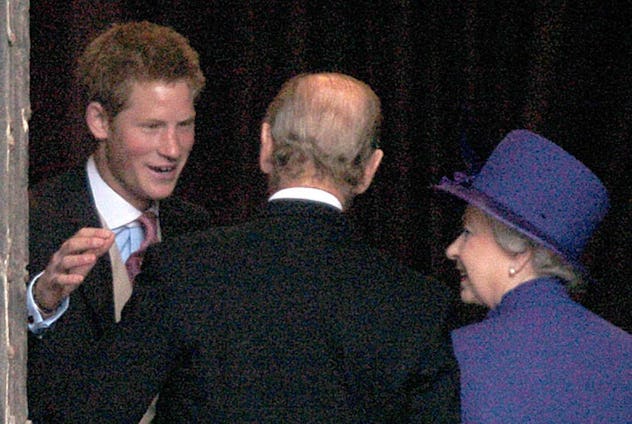 Prince Harry hugs Prince Philip, 2004.