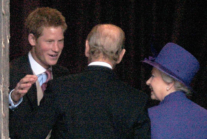Prince Harry hugs Prince Philip, 2004.