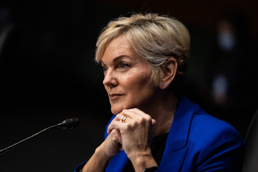 Jennifer Granholm sits behind a microphone in a blue blazer at her Senate confirmation hearing. 