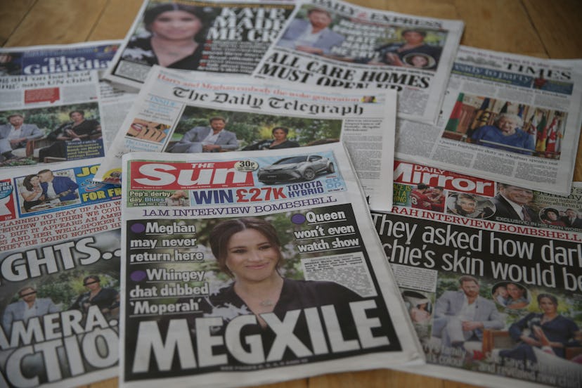 A variety of tabloids with front pages featuring Meghan Markle