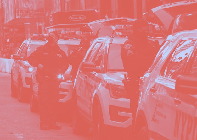 New York Police Department officers arrive outside Trump Tower on March 7, 2021 in New York. - Forme...