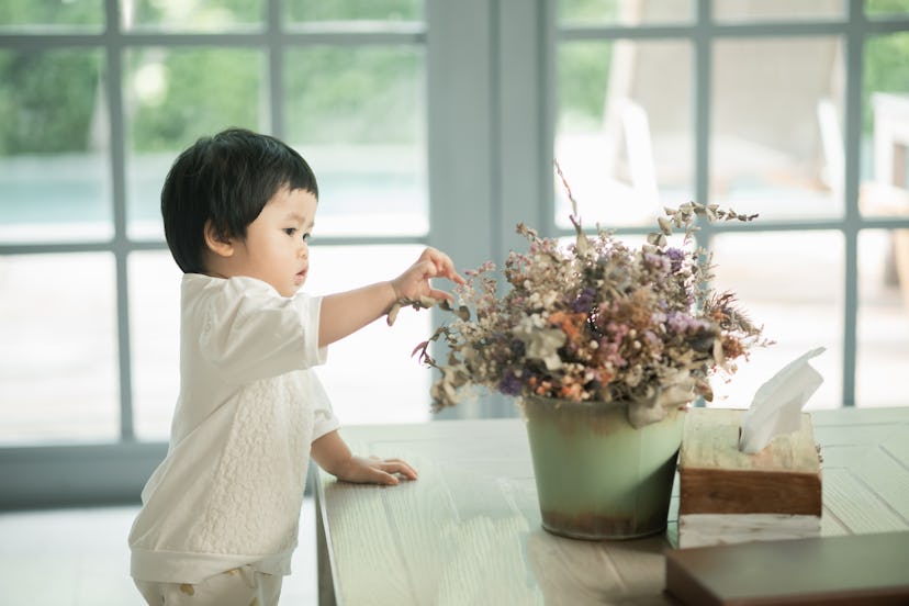 baby and flowers