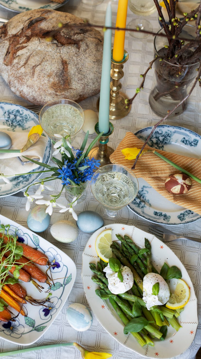 Easter brunch table shot from above, food, spring flowers and and eggs, Sweden