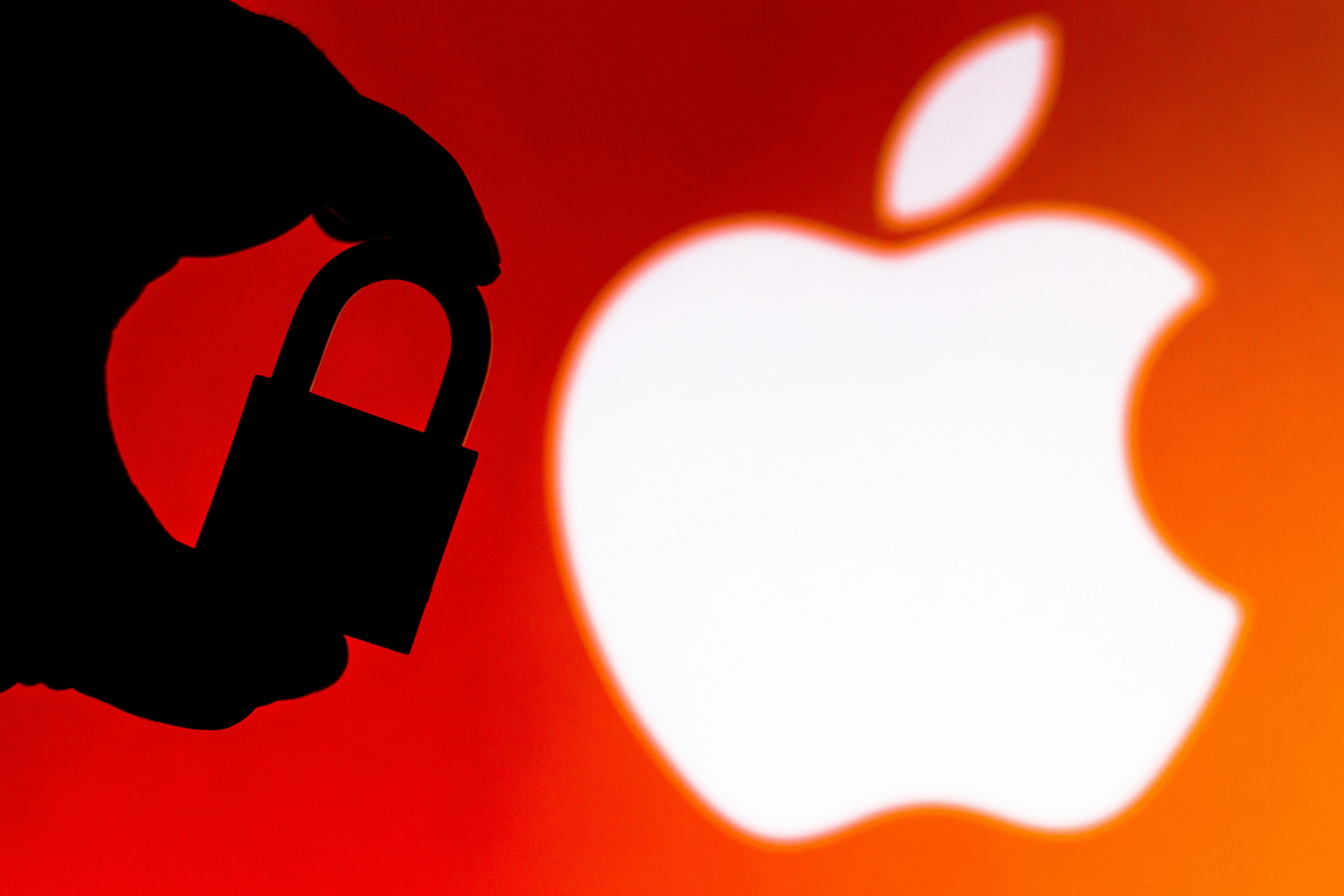BRAZIL - 2020/07/11: In this photo illustration a padlock appears next to the iOS (Apple) logo. Onli...