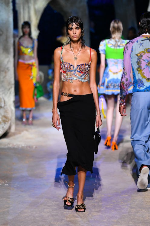 MILAN, ITALY - SEPTEMBER 25: Mica Argañaraz walks the runway at the Versace fashion show during the...