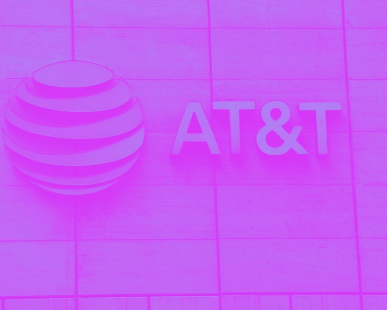 DALLAS, TEXAS - MARCH 13: The logo of AT&T outside of AT&T corporate headquarters on March 13, 2020...