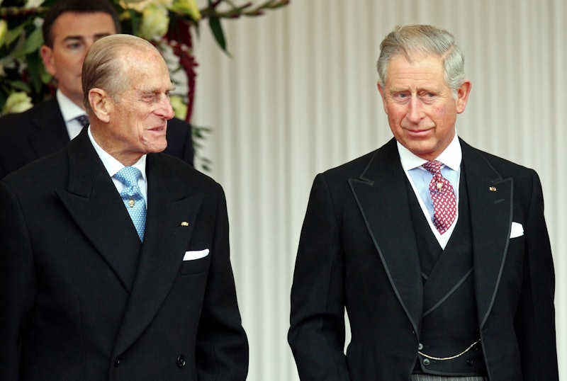 Britain's Prince Philip (L), stands wit his son Prince Charles (R), during a Ceremonial Welcome for ...