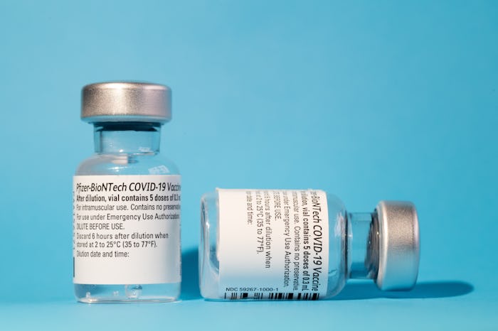In this photo illustration vials of Pfizer - BioNTech vaccines for coronavirus (COVID-19) treatment....