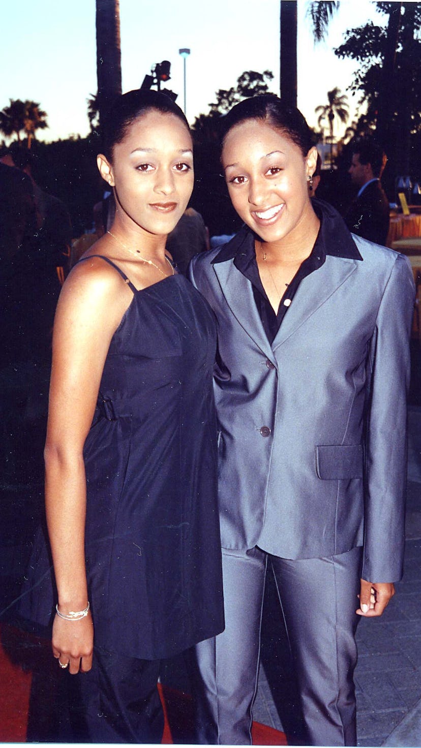 Tia & Tamera Mowry at the 1998 premiere of Snake Eyes in Los Angeles. (Photo by Jeff Kravitz/FilmMag...