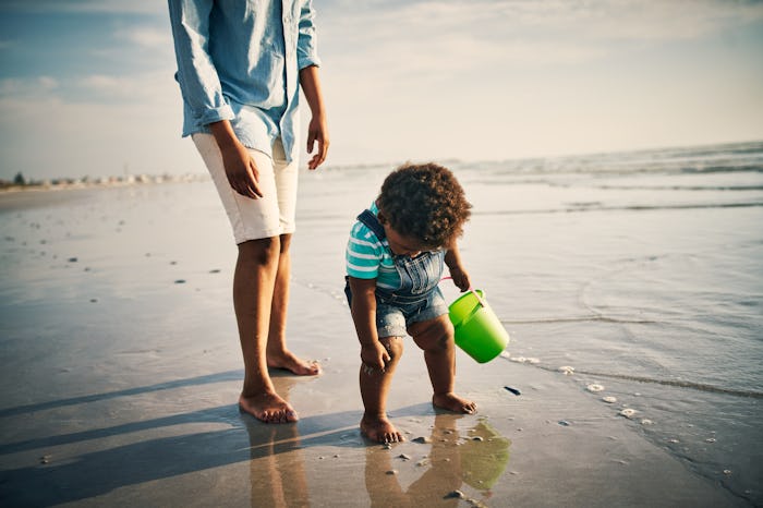 Taking your baby to the beach requires a little extra work.