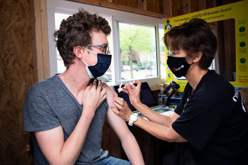 A man receives the one-shot Johnson & Johnson vaccine. The vaccine has now been paused in the U.S. a...