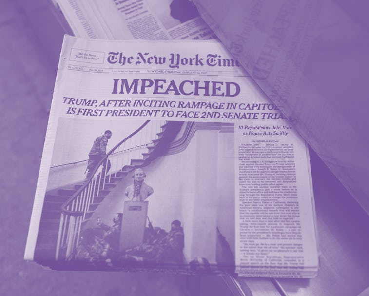 NEW YORK, NY - JANUARY 14: The front page of The New York Times newspaper shows National Guard soldi...